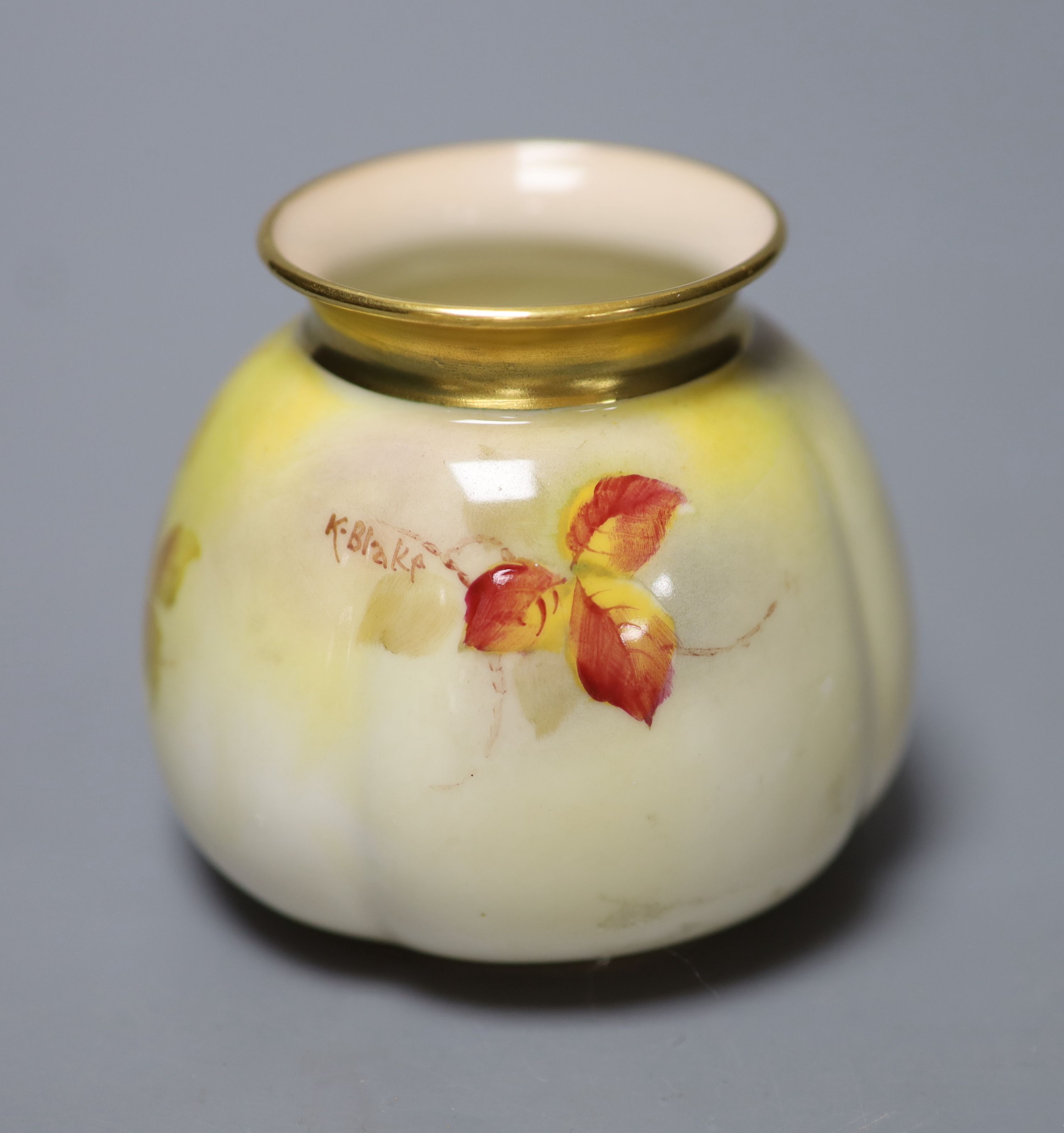 A Royal Worcester moulded vase shape 158H painted with autumnal leaves and berries by K. Blake, signed date, code 1939, height 7.5cm